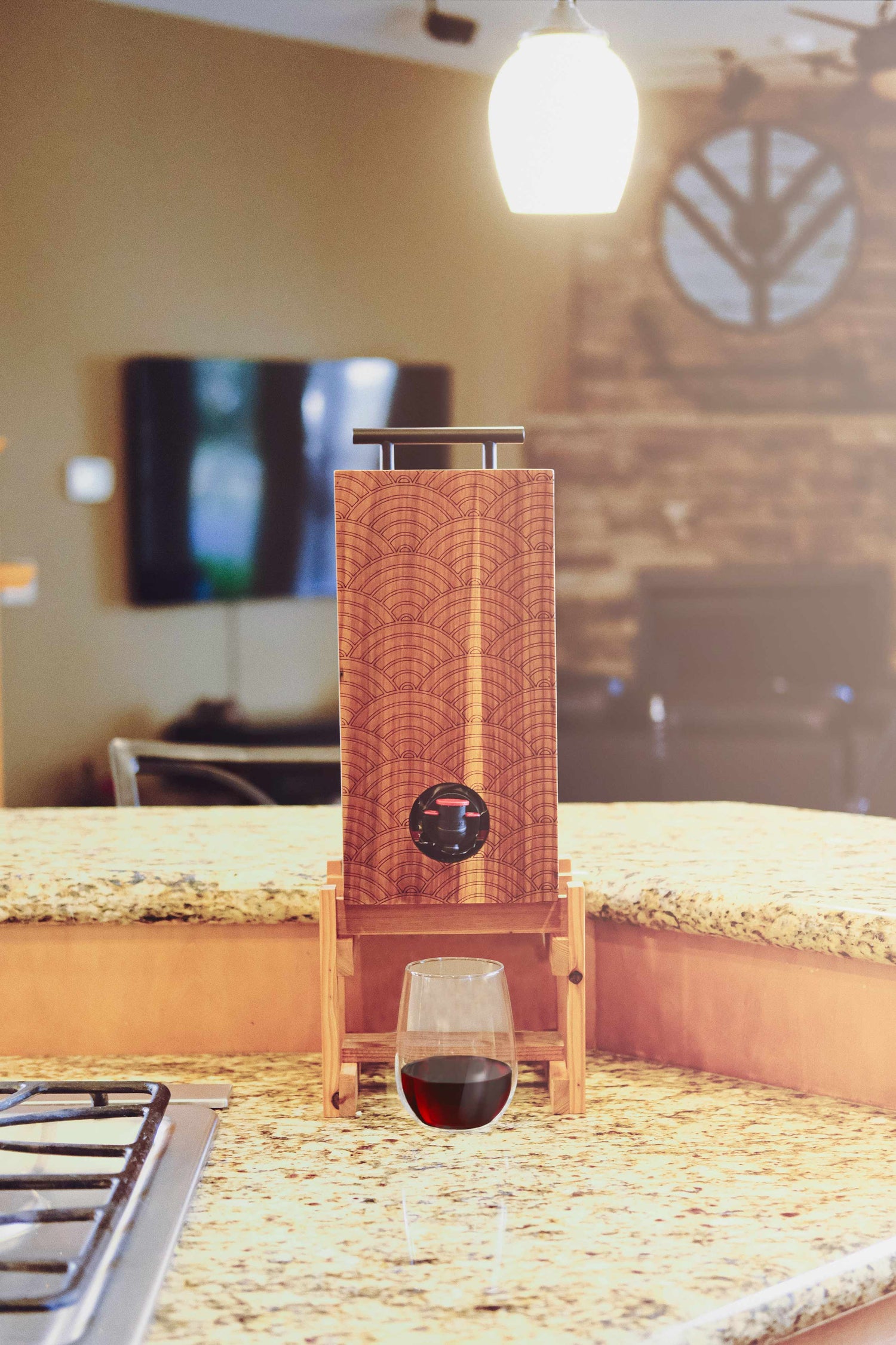 Weekend walls BevBox beverage dispenser with red wine in stemless wine glass 