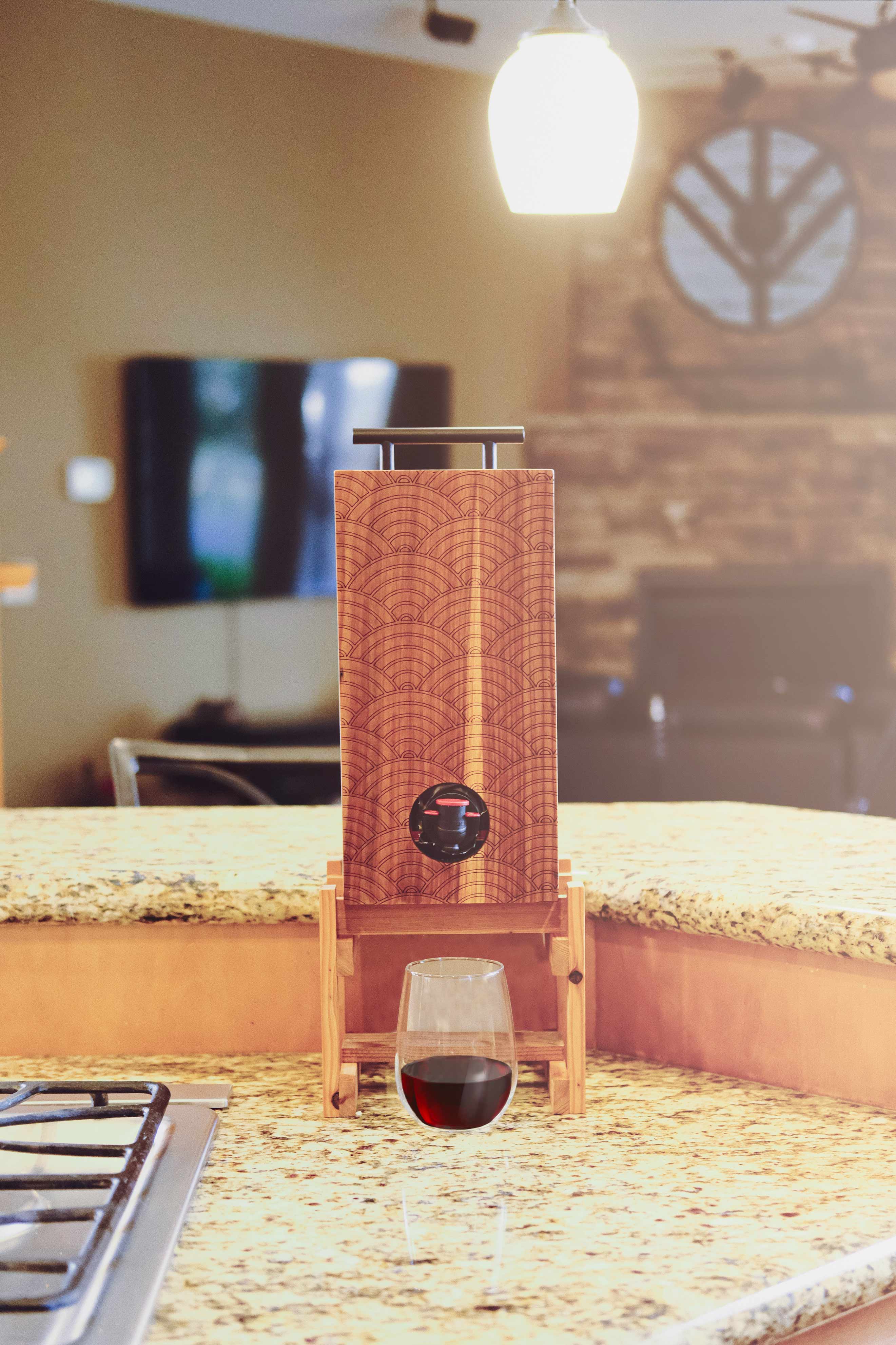 Weekend walls BevBox beverage dispenser with red wine in stemless wine glass 