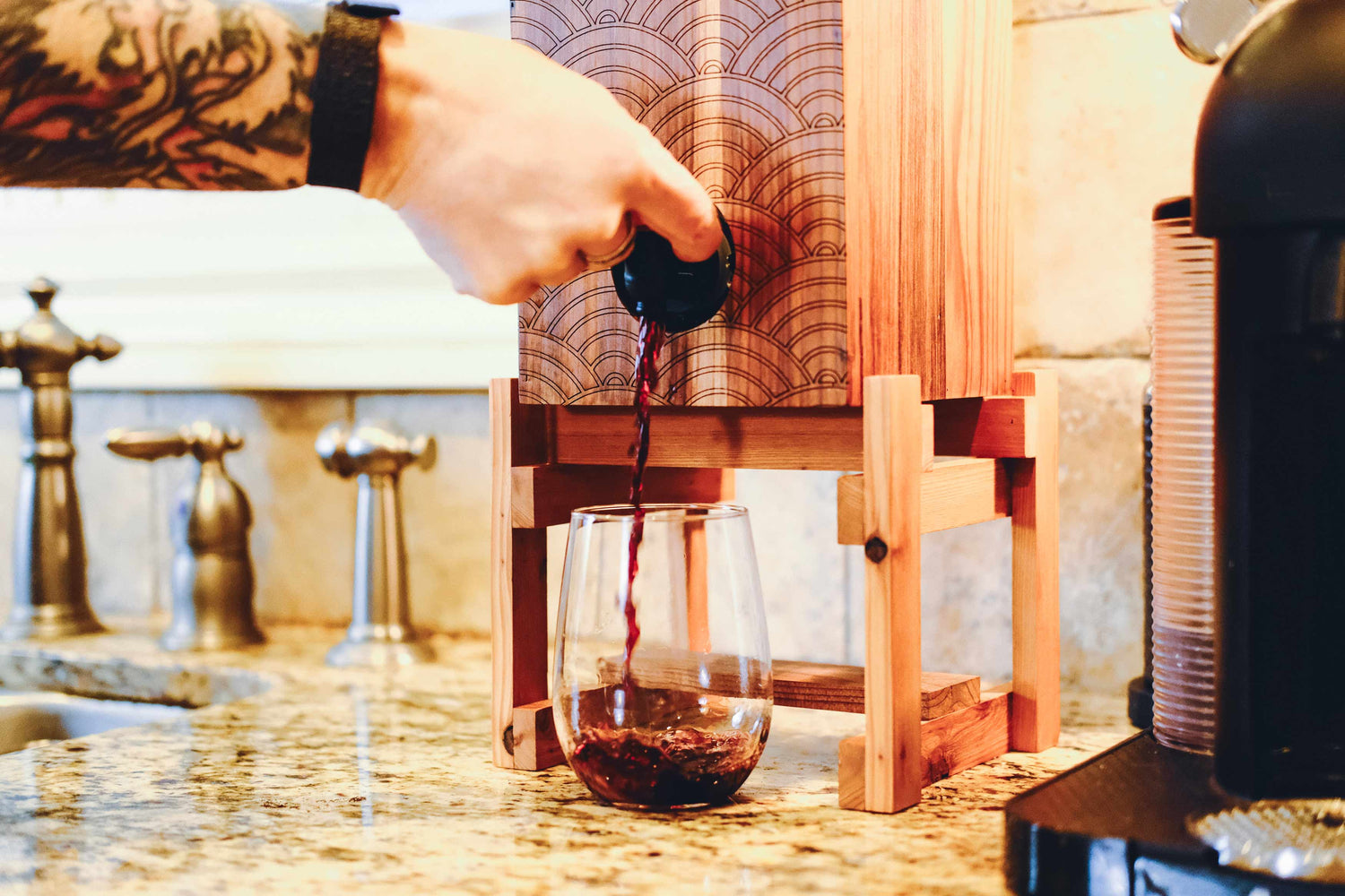 Weekend Walls seigaiha pattern wine dispenser pouring red wine